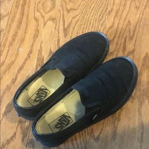 All black slip-on vans